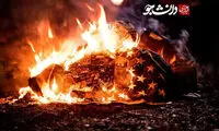 تصویری از پرچم سوخته آمریکا در اعتراضات پورتلند