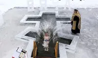 عکس: غسل تعمید میان آب و یخ
