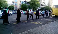 راهپیمایی هواداران میرسلیم با کلاه ایمنی