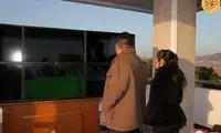رهبر کره شمالی و دخترش درحال تماشای آزمایش موشکی
