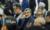 لحظه تسلیت گفتن احمدی‌نژاد به فرزند رهبر شهید