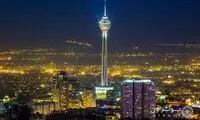 قاب دیدنی از ماه گرفتگی در کنار برج میلاد تهران