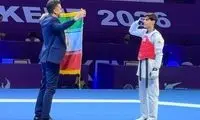 سلام نظامی پسر طلایی تکواندو به پرچم ایران