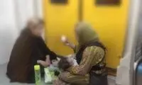 عکسی که فقر زنانه را در قلب تهران نمایش می‌دهد