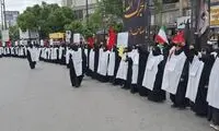 تصویری از حضور زنان کفن‌پوش در ایستگاه مترو تئاتر شهر