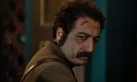 عکس هنری بازیگر شکارگاه در ترکیبی از نور و تاریکی