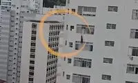 آویزان شدن یک زن از طبقه ۱۶ یک برج!