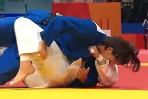 جودوکار زن چینی با دندان به جان جودوکار ژاپنی افتاد