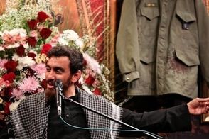 لباس خونین شهدای حمله اسرائیل در یک هیات عزاداری