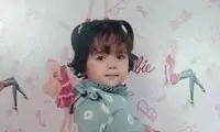 تصویری غم‌انگیز از سنگ مزار دختر کاپشن صورتی