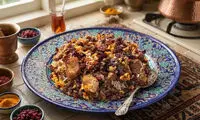 طرز تهیه رب پلو شیرازی با مرغ، گردو و رب انار 