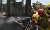 سقوط دو کارگر در آتش‌سوزی ساختمانی در غرب تهران