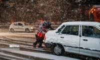 تصاویری که نشان می‌دهد برف در تهران دردسر شد