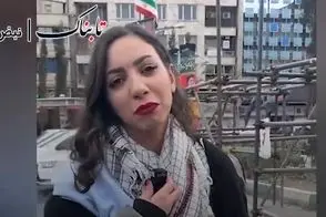 تصاویر دختر بی‌حجاب و روحانی در کنار هم در راهپیمایی