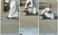 امام‌جمعه گناوه در حال تمیز کردن ورودی فاضلاب
