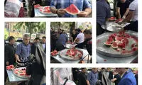 توزیع هندوانه نذری در میدان حسن آباد تهران