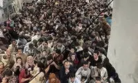 فرار افغانستانی‌ها از کابل با هواپیمای ارتش آمریکا