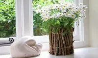 تزیین گلدان با شاخه های باریک درخت