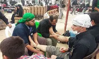 «ماساژ درمانی» زائران پیاده کربلا +عکس