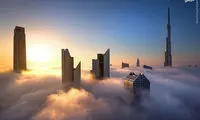 بلندترین برج جهان در تسخیر مِه +عکس