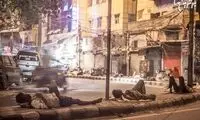 کارگران هندی که در پیاده روها می خوابند