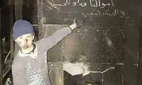 عکس: ارادت خاص یک کودک به اباعبدالله