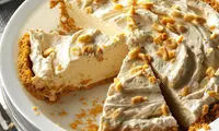 طرز تهیه‌ی چیزکیک یخچالی کره بادام زمینی بدون فر