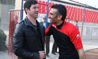 بوسه هاشمی‌نسب بر صورت کریم باقری