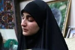 تصویری از زینب سلیمانی در مراسم تشییع شهدا