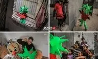 معلم فلسطینی در لباس کرونا