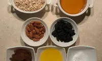 گرانولا بادام و کشمش؛ این شیرینی خوش طعم آجیلی!