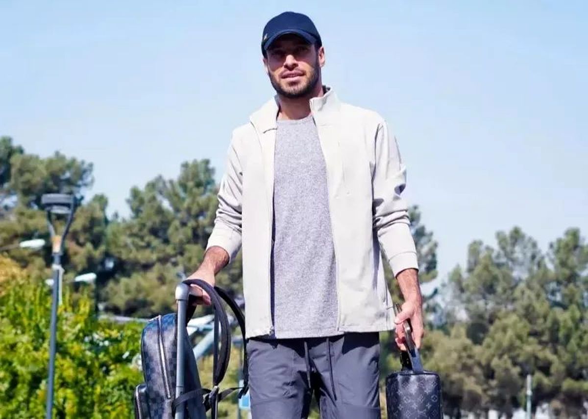 درگیری عجیب خلیل‌زاده با یک خبرنگار در فرودگاه