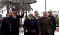 استقبال لاریجانی از روحانی در یک روز بارانی
