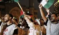 تصاویری از کفن‌پوشی هواداران حزب الله در تهران