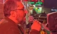 شعار علیه الهام علی‌اف در میدان کاج تهران