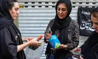 تصایری از نذر حلوا در چهارراه گلوبندک تهران