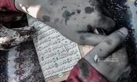 داستان زن فلسطینی بیرون آمده از زیر آوار با قرآن در دست