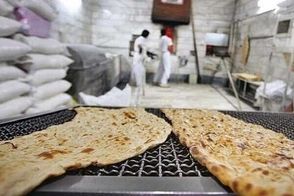 بنر نانوایی یک شهرستان درباره اتباع جلب توجه کرد