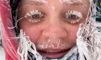 یخ زدن مو‌ها و مژه‌های یک زن در آمریکا