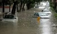 تصاویری از بارش شدید باران در خیابان های قم
