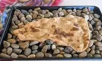 چینی‌ها نان سنگک را به این شکل می‌پزند!