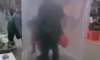 ایده عجیب زوج چینی برای مبتلا نشدن به کرونا 