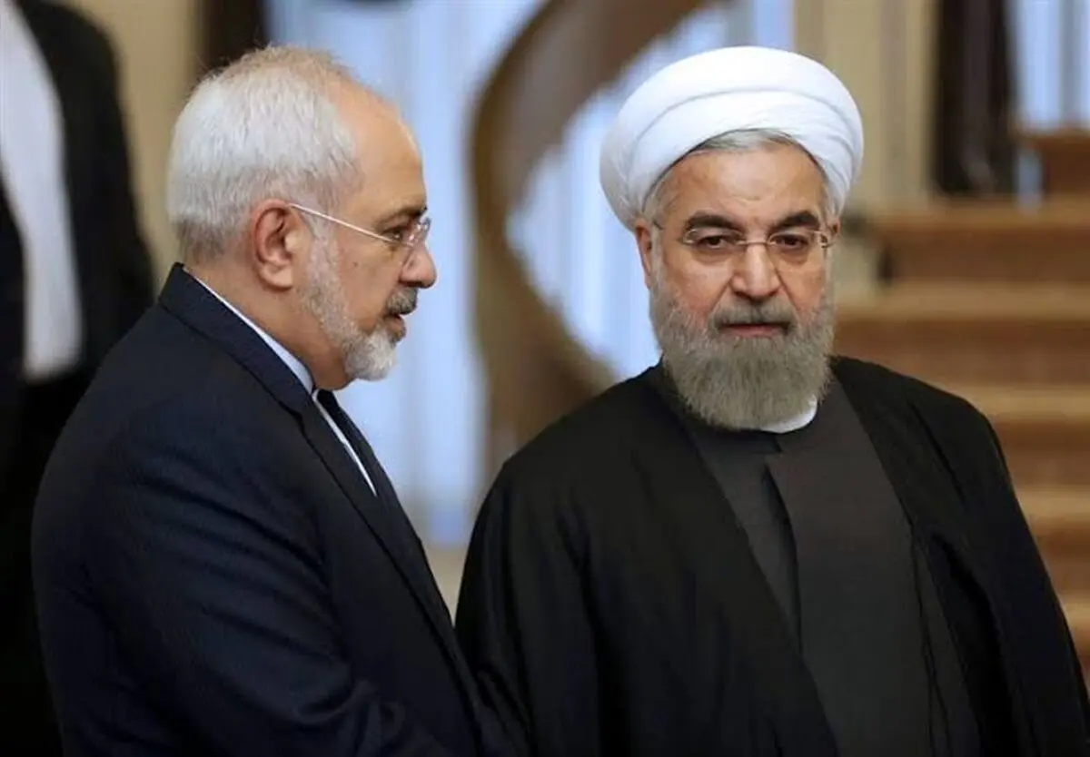عکس روحانی و ظریف را در تجمات شبانه آتش زدند
