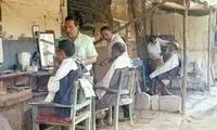 عکس زیرخاکی از بساط سلمانی‌های میدان شوش