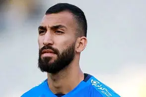 جمله تتو شده روی دست روزبه چشمی جلب توجه کرد