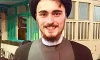 پوشش متفاوت احمد خمینی در ورزشگاه آزادی