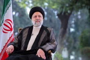 بنر توهین‌آمیز به رییس‌جمهور شهید