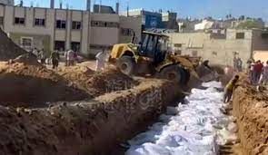 تصاویری عجیب از دفن اجساد مردم غزه با لودر