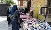 عکس احساسی از یک مادر دستفروش در خیابان
