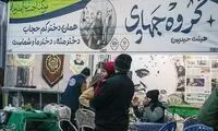 عکس با ماکت سردار سلیمانی در ورودی گلزار شهدا